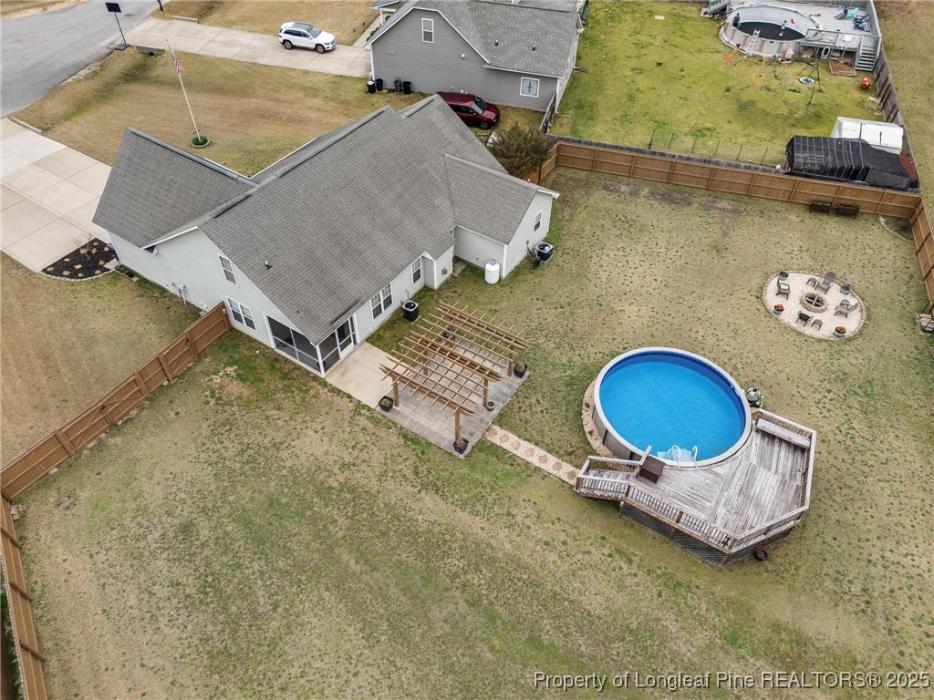 6657 Hillbrook Road Hope Mills, NC 28348 - Photo 43 of 50 an aerial view of a house with backyard space and a kitchen