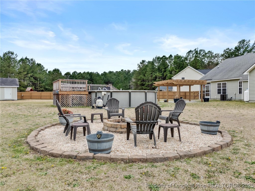 6657 Hillbrook Road Hope Mills, NC 28348 - Photo 44 of 50 swimming pool view with a seating space