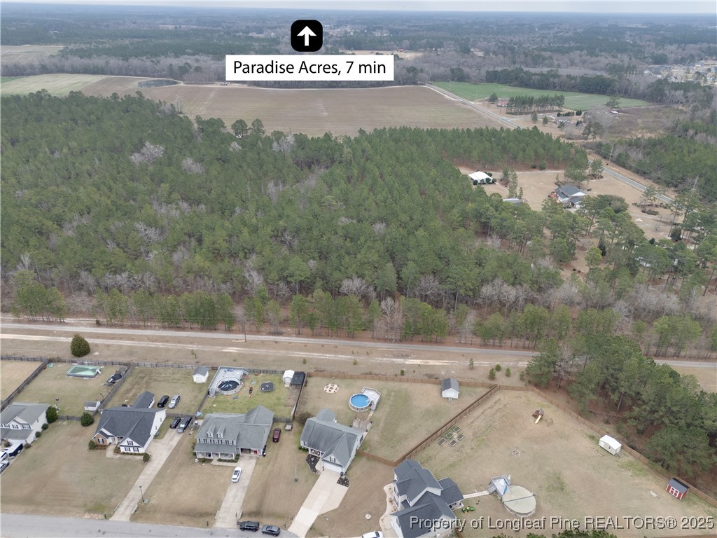 6657 Hillbrook Road Hope Mills, NC 28348 - Photo 49 of 50 an aerial view of a house with a yard