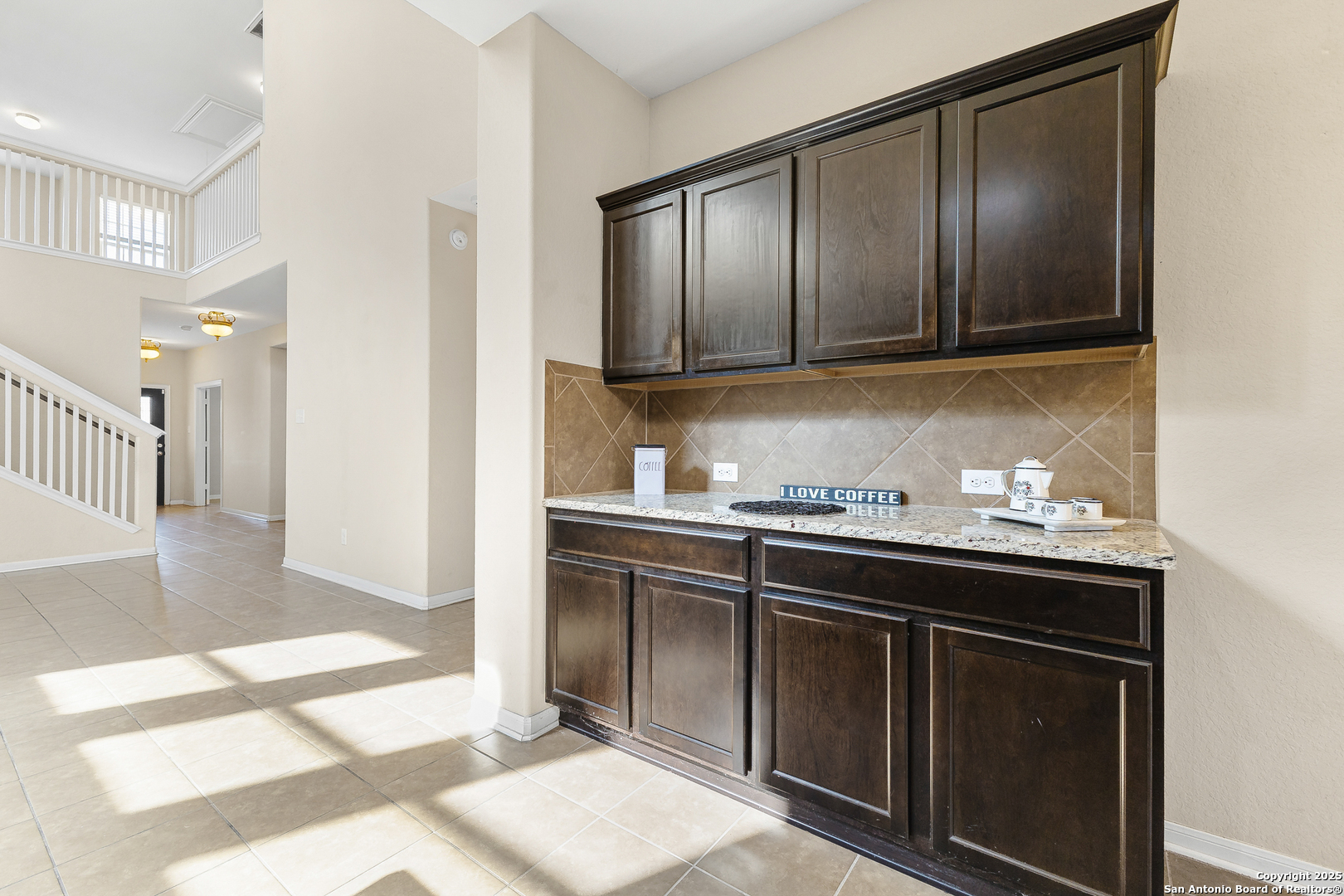 4402 Rucker Park Converse, TX 78109 - Photo 11 of 25 a kitchen with granite countertop stainless steel appliances and sink