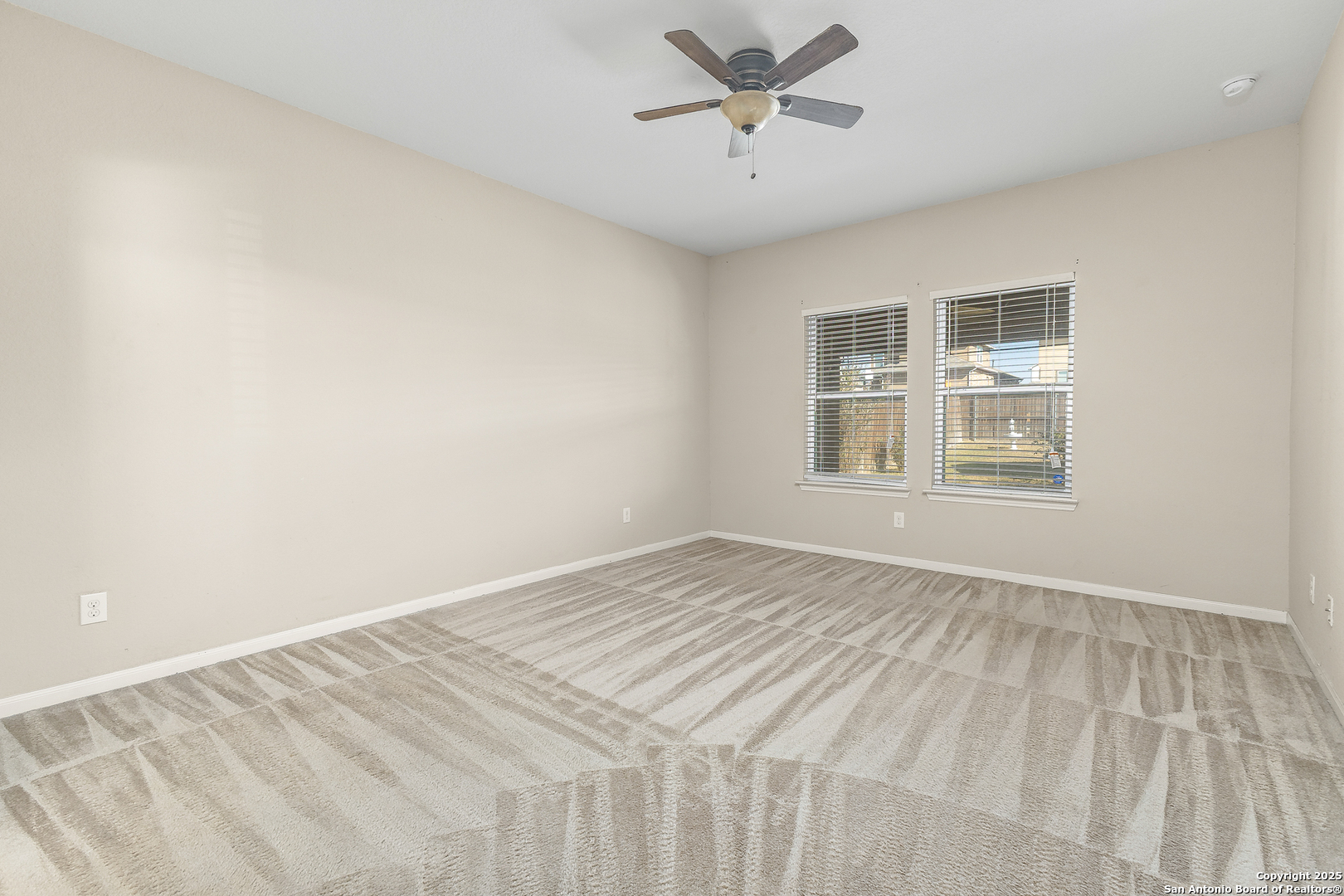 4402 Rucker Park Converse, TX 78109 - Photo 13 of 25 a view of an empty room with a window