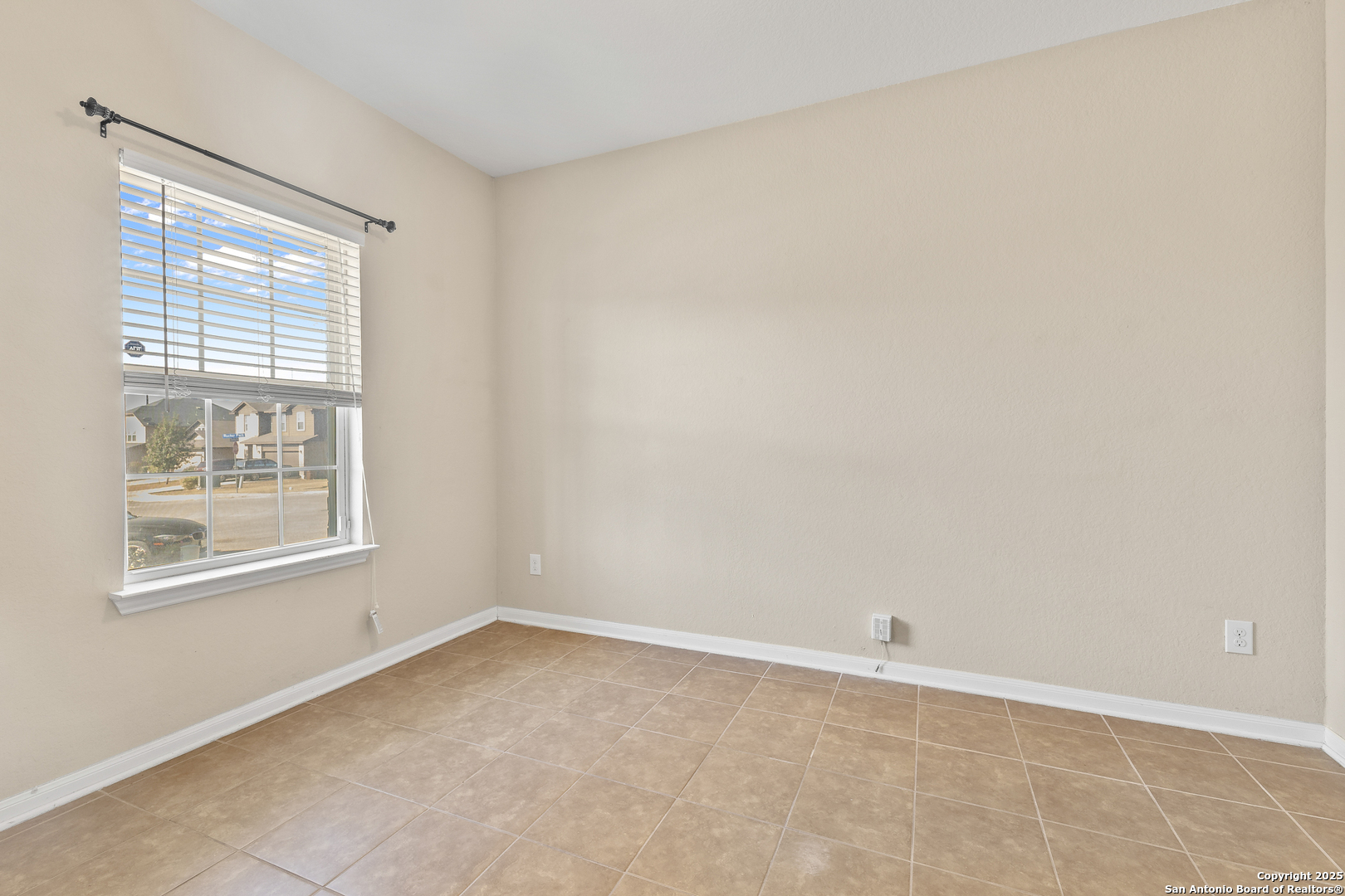4402 Rucker Park Converse, TX 78109 - Photo 3 of 25 an empty room with windows
