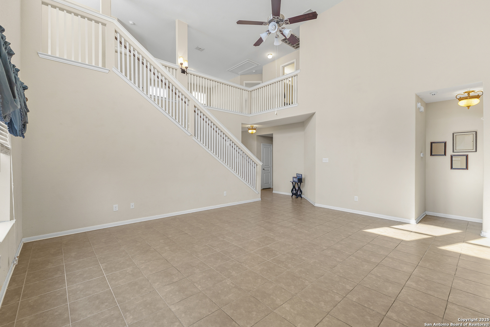 4402 Rucker Park Converse, TX 78109 - Photo 7 of 25 a view of an empty room with stairs