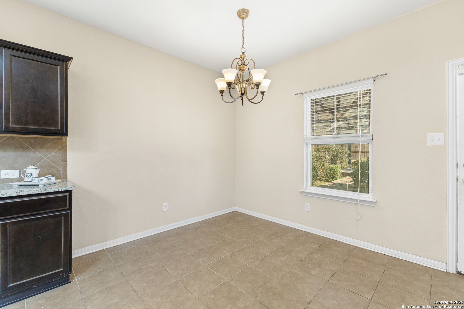 4402 Rucker Park Converse, TX 78109 - Photo 10 of 25 a view of an empty room with a window