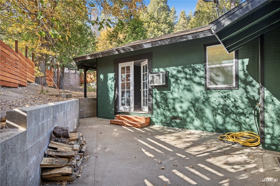528 Springy Path Crestline, CA 92325 - Photo 14 of 20 Patio Area Just Outside One of the Bedrooms