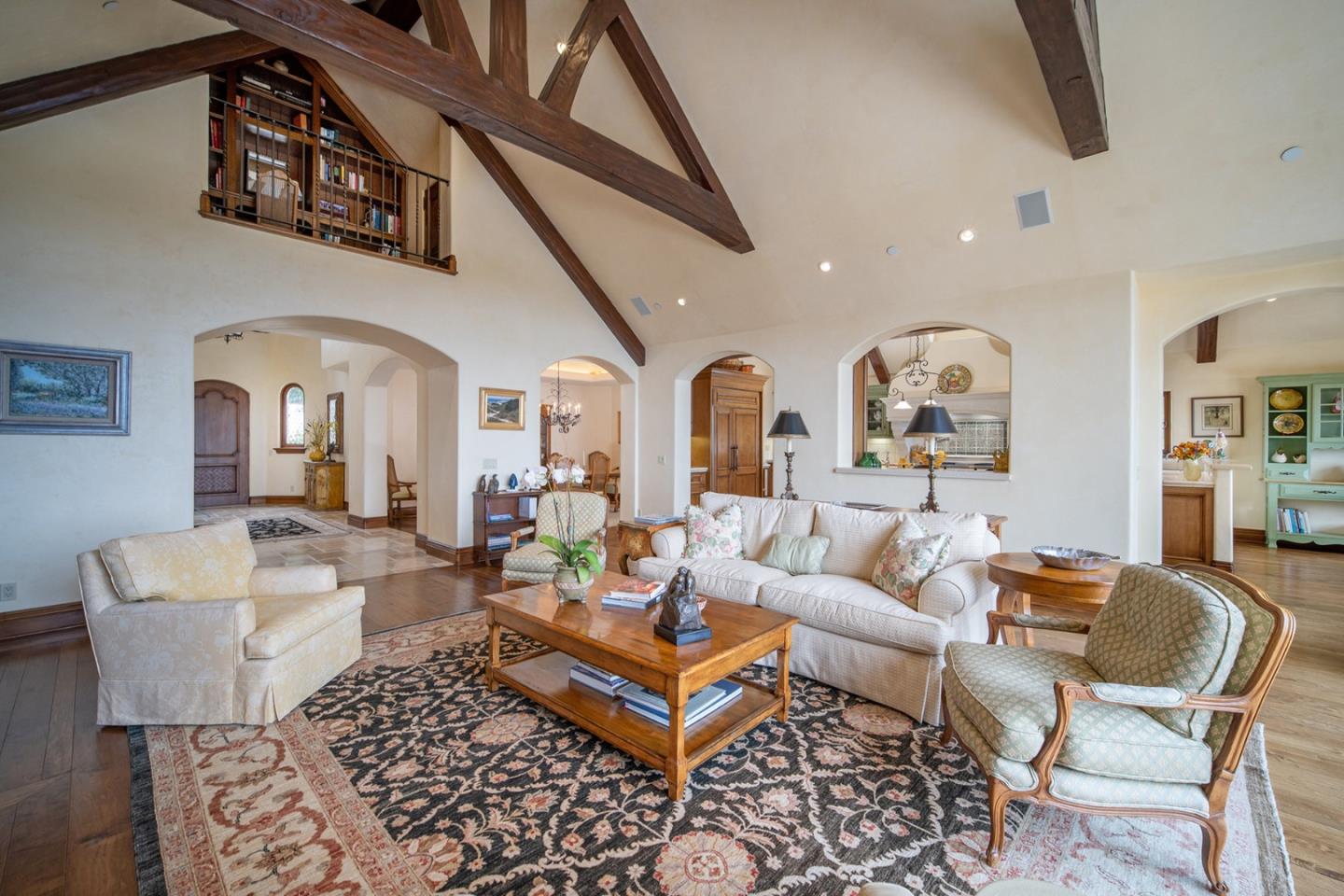 1606 Sonado Road Pebble Beach, CA 93953 - Photo 11 of 47 a living room with fireplace furniture and a rug