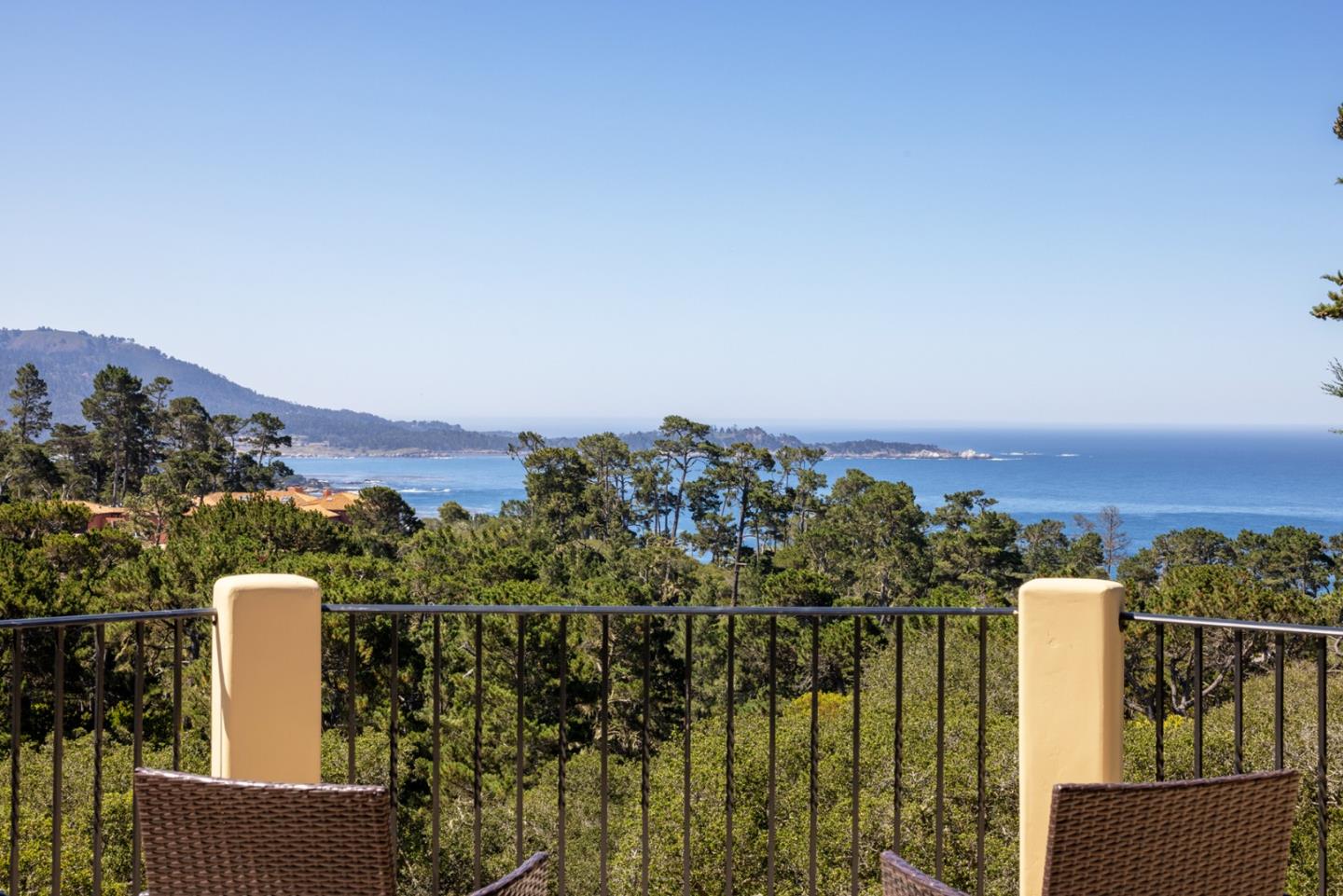 1606 Sonado Road Pebble Beach, CA 93953 - Photo 2 of 47 a view of a city with tall buildings