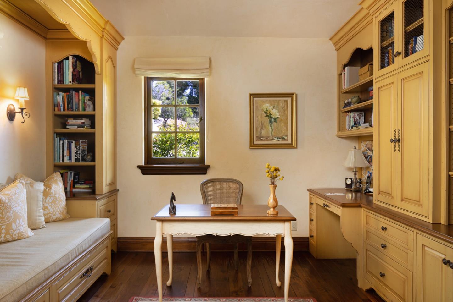 1606 Sonado Road Pebble Beach, CA 93953 - Photo 22 of 47 a room with a workspace and a couch