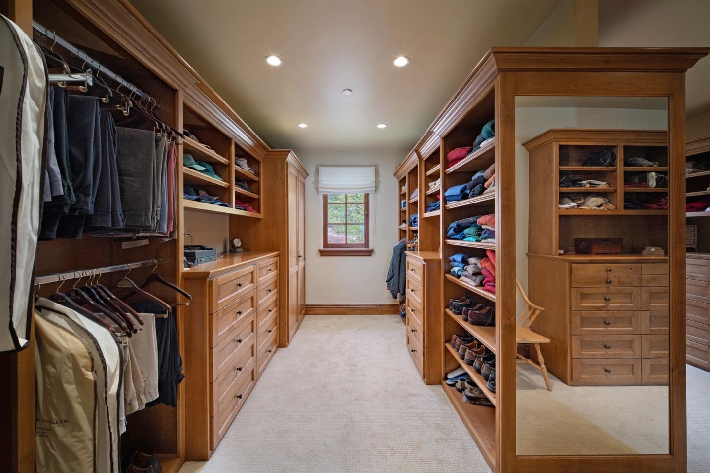 1606 Sonado Road Pebble Beach, CA 93953 - Photo 28 of 47 a view of walk in closet with clothes and shoes