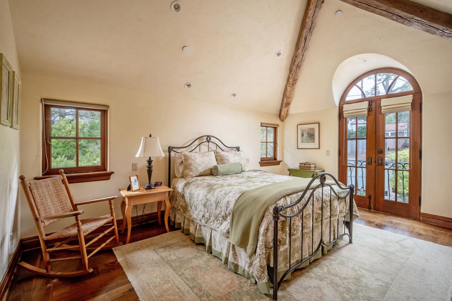 1606 Sonado Road Pebble Beach, CA 93953 - Photo 33 of 47 a bedroom with a bed and a view of mirror