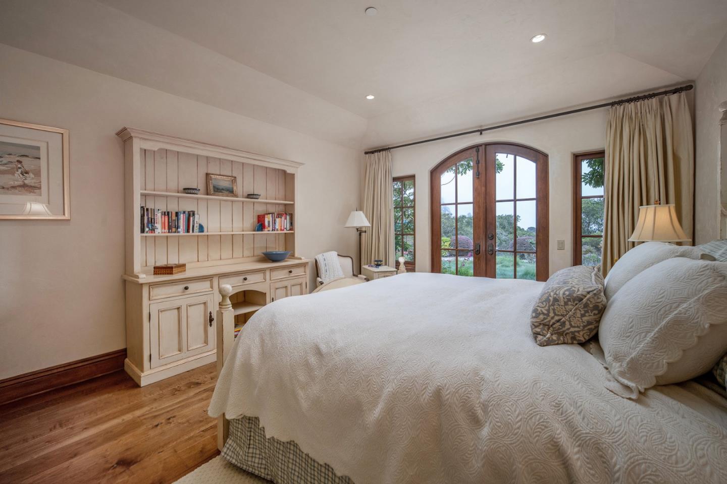 1606 Sonado Road Pebble Beach, CA 93953 - Photo 42 of 47 a spacious bedroom with a large bed and a window