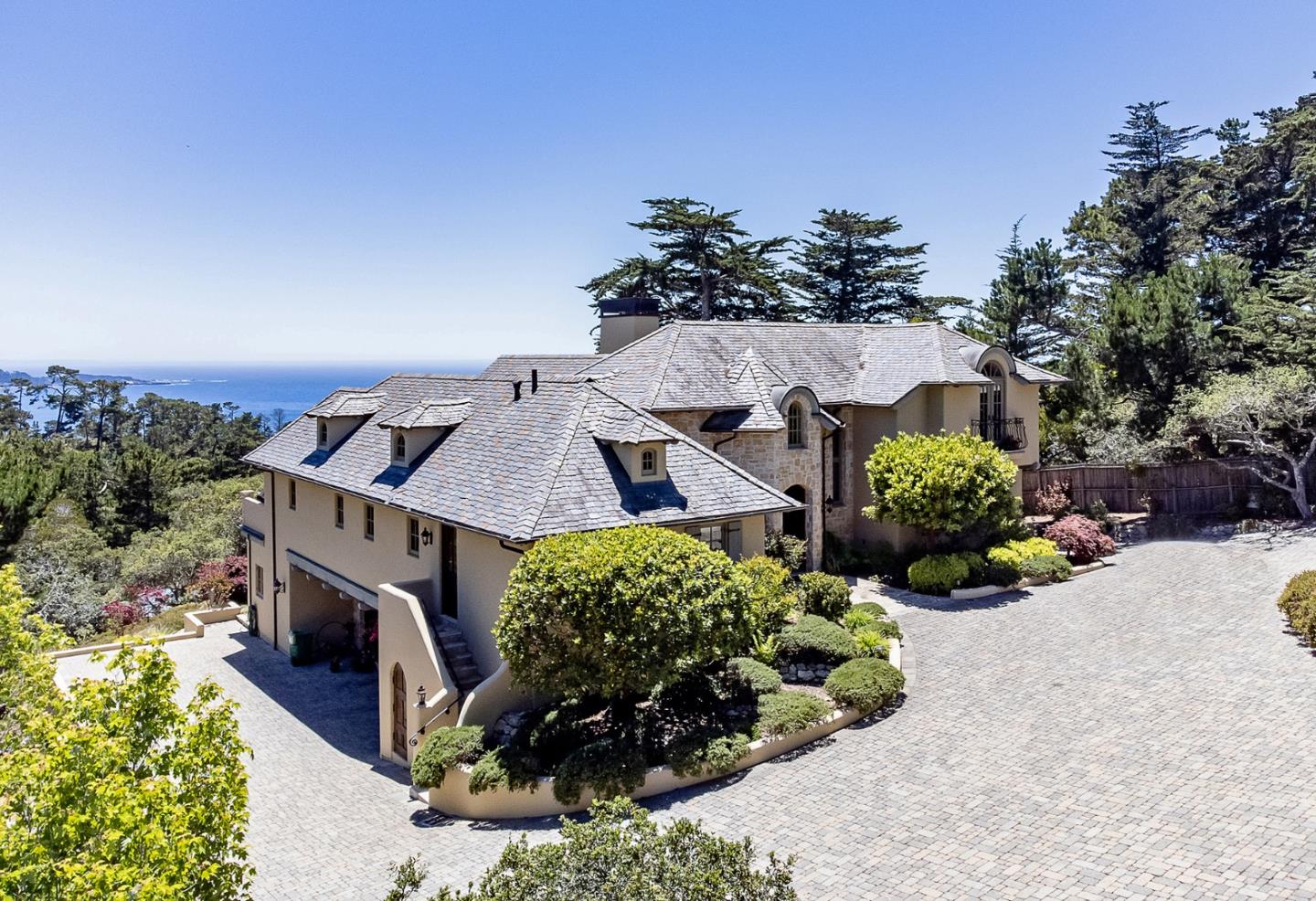 1606 Sonado Road Pebble Beach, CA 93953 - Photo 45 of 47 an aerial view of a house with a yard and trees