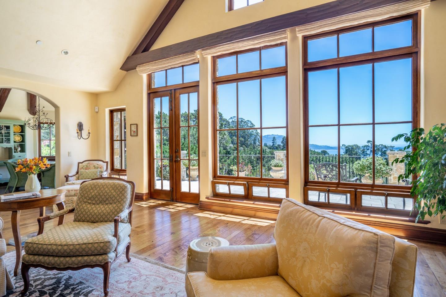 1606 Sonado Road Pebble Beach, CA 93953 - Photo 9 of 47 a living room with furniture and floor to ceiling windows