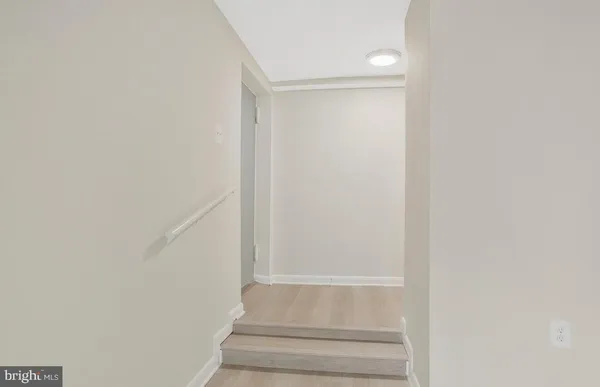 a view of entryway with white walls