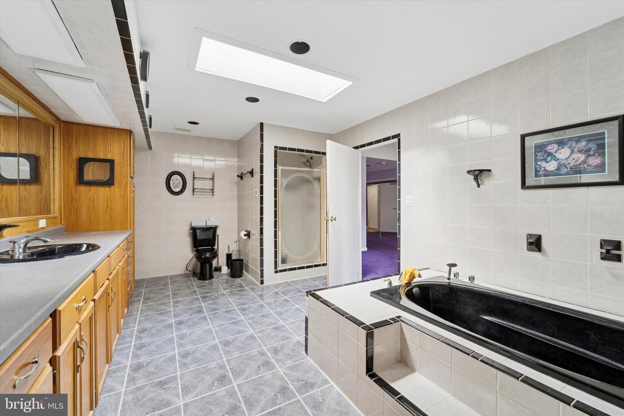 3418 Mill Road Collegeville, PA 19426 - Photo 22 of 35 a kitchen with stainless steel appliances granite countertop a stove and a sink