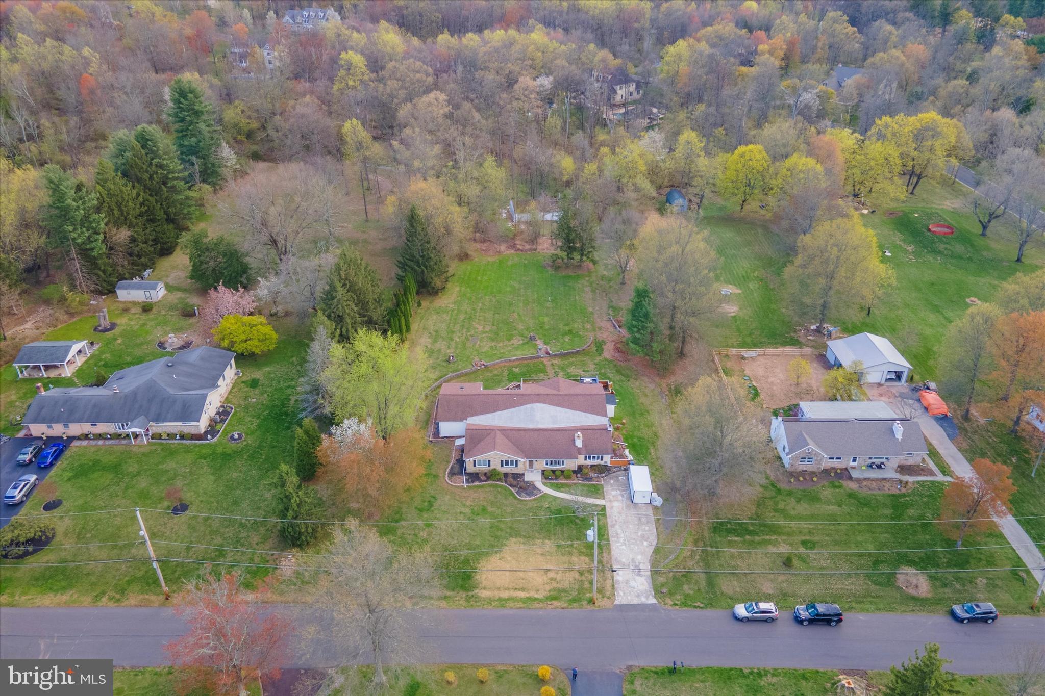 3418 Mill Road Collegeville, PA 19426 - Photo 3 of 35 an aerial view of residential houses with outdoor space