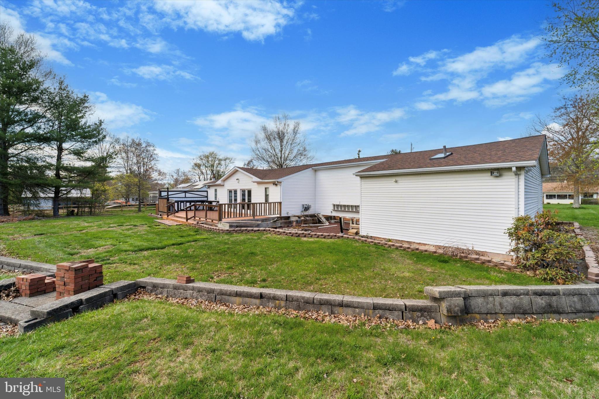3418 Mill Road Collegeville, PA 19426 - Photo 31 of 35 a view of backyard with swimming pool and green space