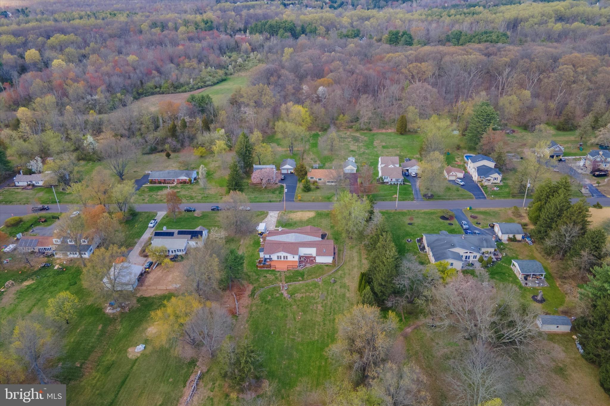 3418 Mill Road Collegeville, PA 19426 - Photo 33 of 35 an aerial view of residential houses with outdoor space and trees