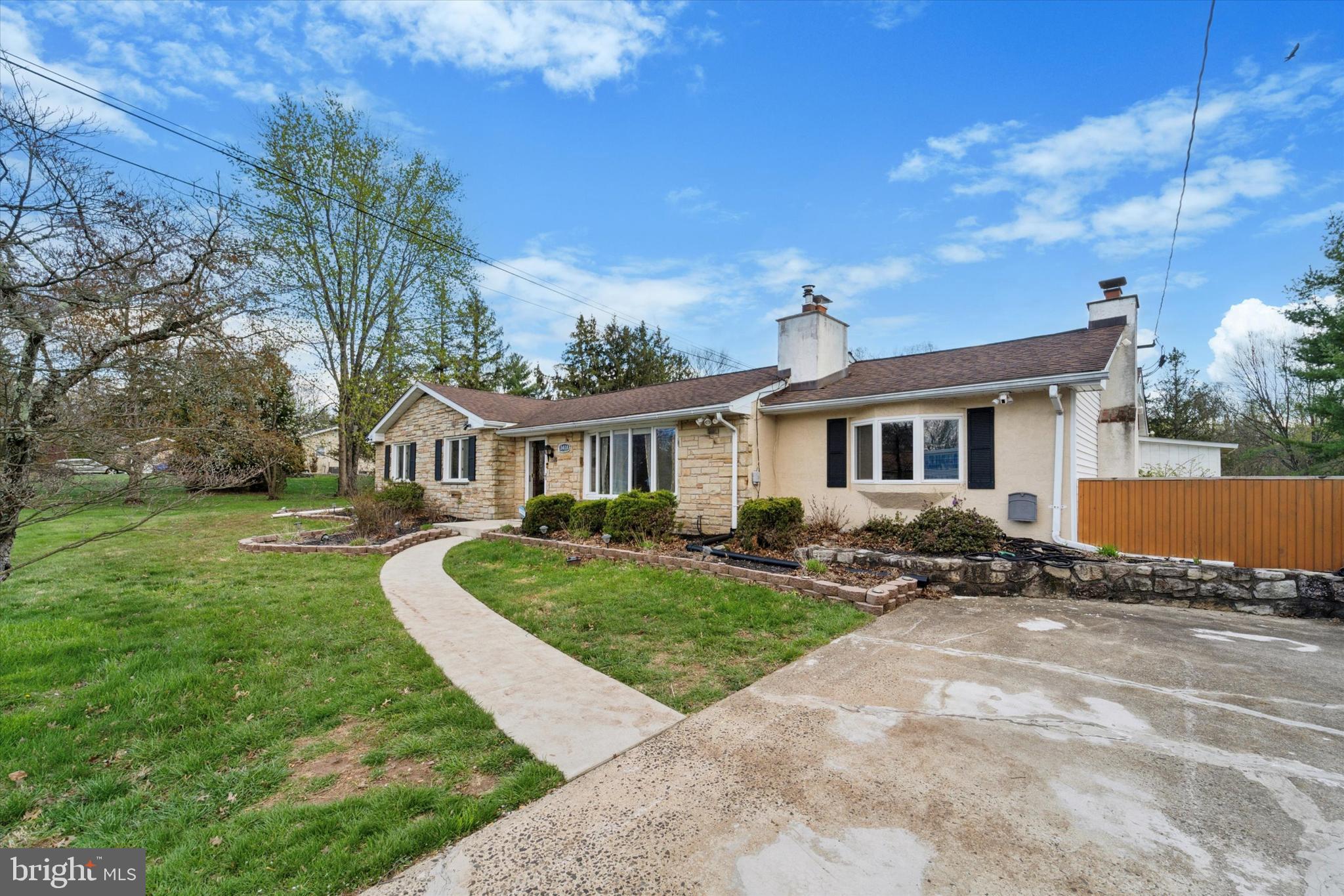 3418 Mill Road Collegeville, PA 19426 - Photo 4 of 35 a front view of a house with a yard