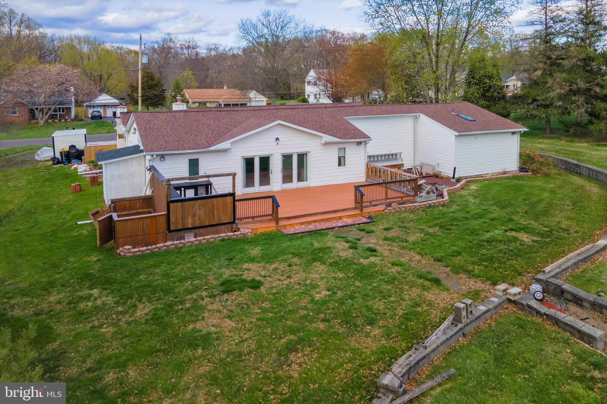 3418 Mill Road Collegeville, PA 19426 - Photo 6 of 35 an aerial view of a house with garden space and a house