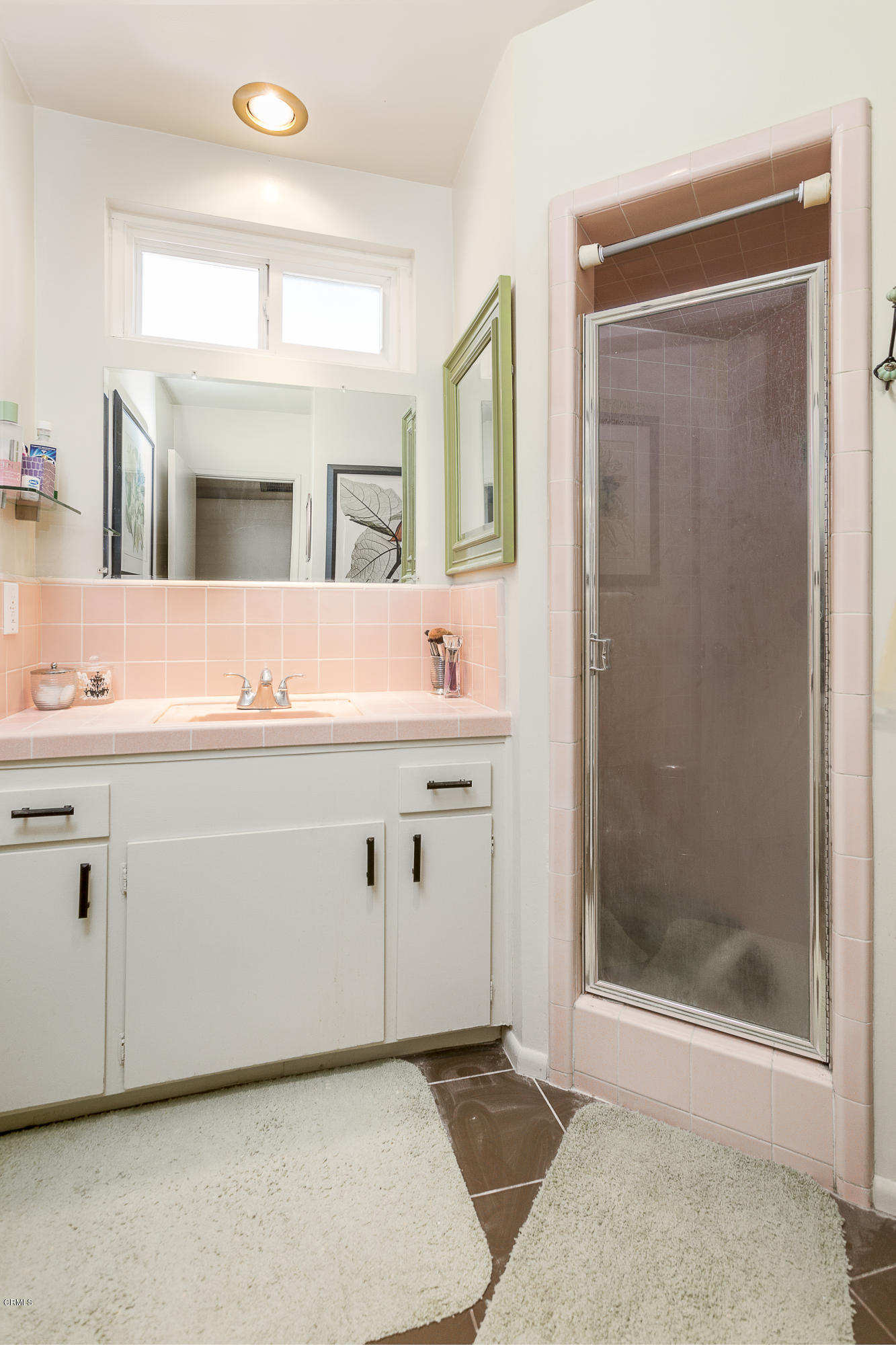 385 Cliff Drive, Unit 3 Pasadena, CA 91107 - Photo 8 of 13 a bathroom with a sink mirror and a shower