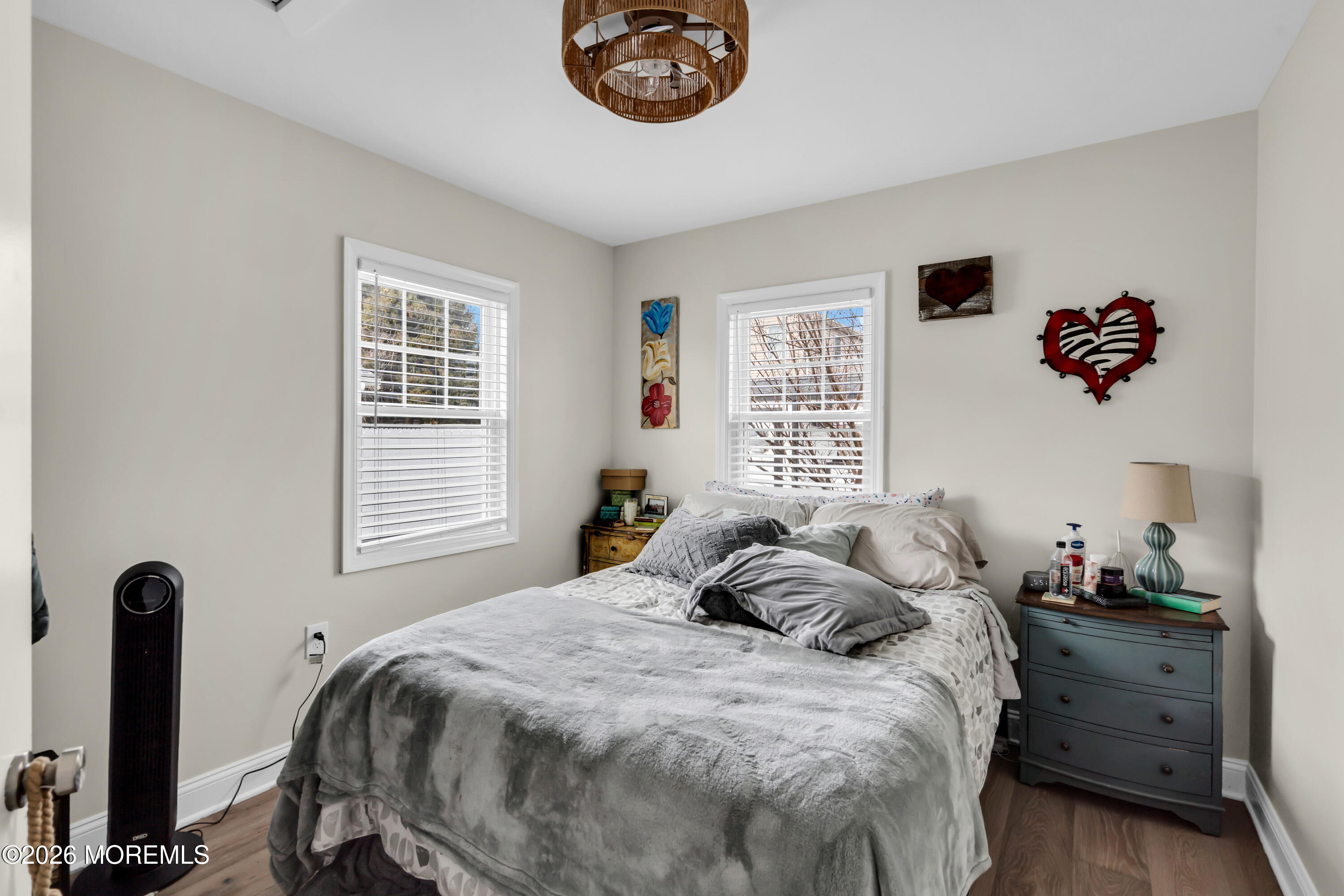 1215 Lister Street, Unit B Point Pleasant, NJ 08742 - Photo 11 of 16 a bed sitting in a bedroom next to a window