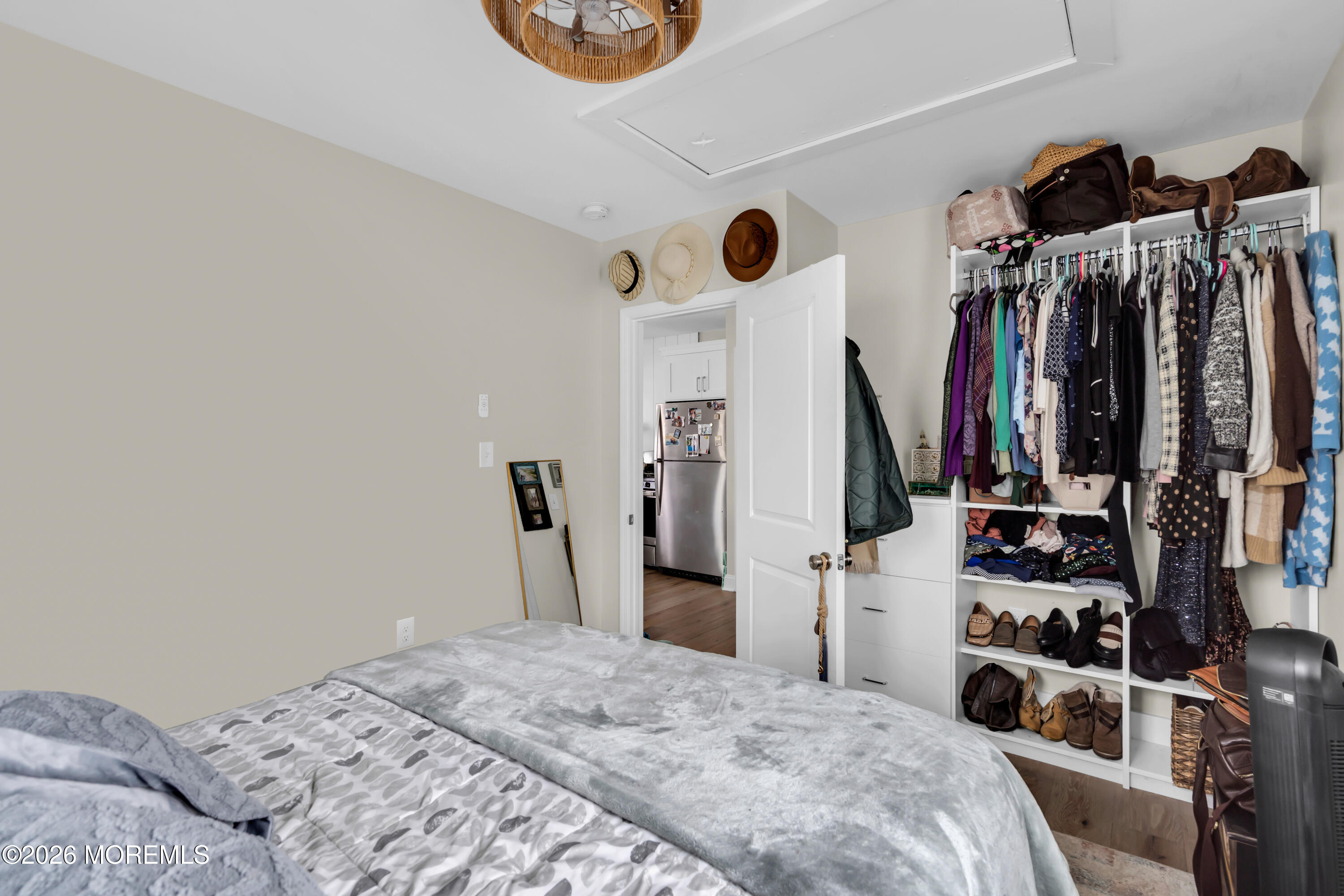 1215 Lister Street, Unit B Point Pleasant, NJ 08742 - Photo 12 of 16 a bedroom with a bed and a window