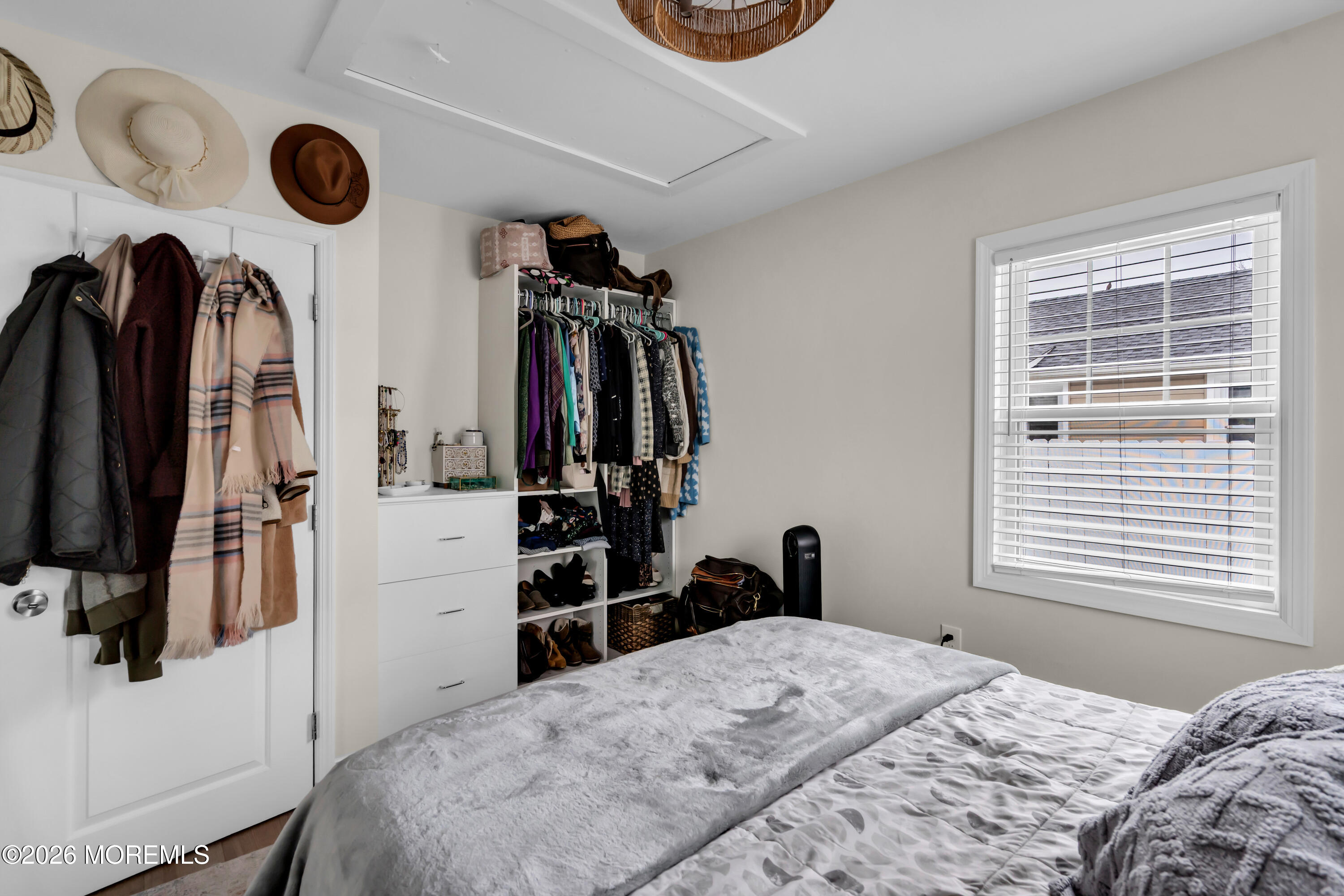 1215 Lister Street, Unit B Point Pleasant, NJ 08742 - Photo 13 of 16 a bedroom with a bed and a window