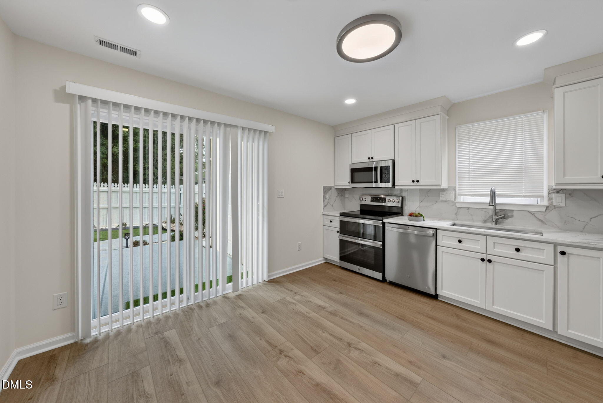 112 Poppy Trail Durham, NC 27713 - Photo 23 of 26 Kitchen slide door
