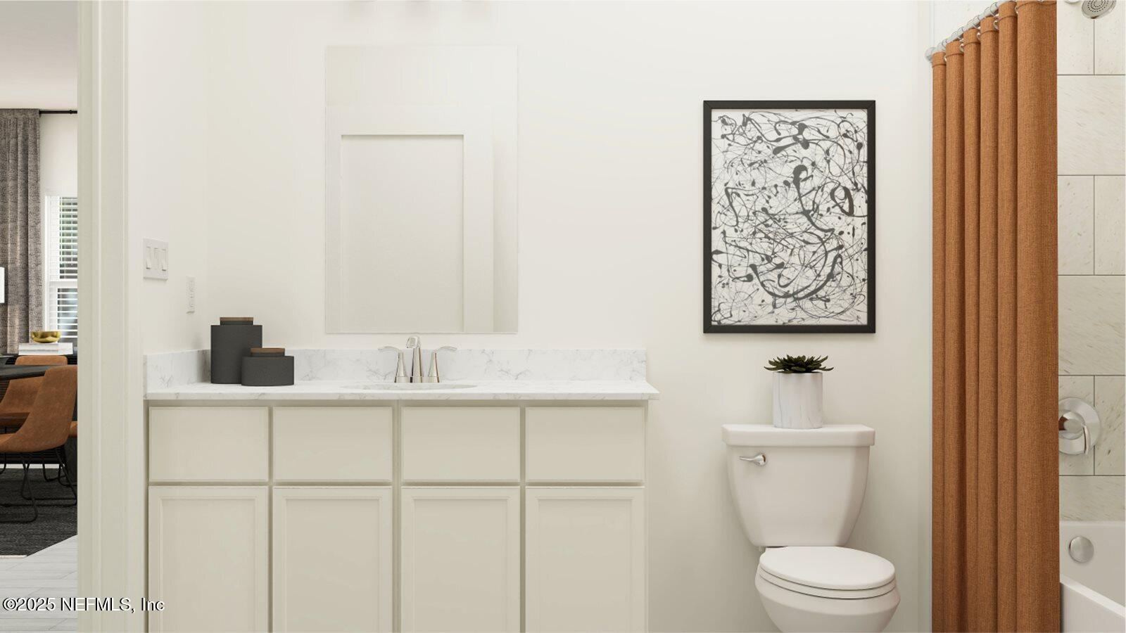 509 Kingbird Drive St. Augustine, FL 32092 - Photo 2 of 23 a bathroom with a toilet a sink and mirror