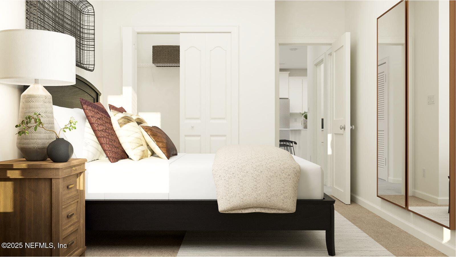 509 Kingbird Drive St. Augustine, FL 32092 - Photo 5 of 23 a bedroom with a bed and wooden floor