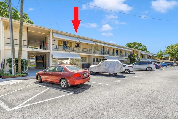 a car parked in front of a building