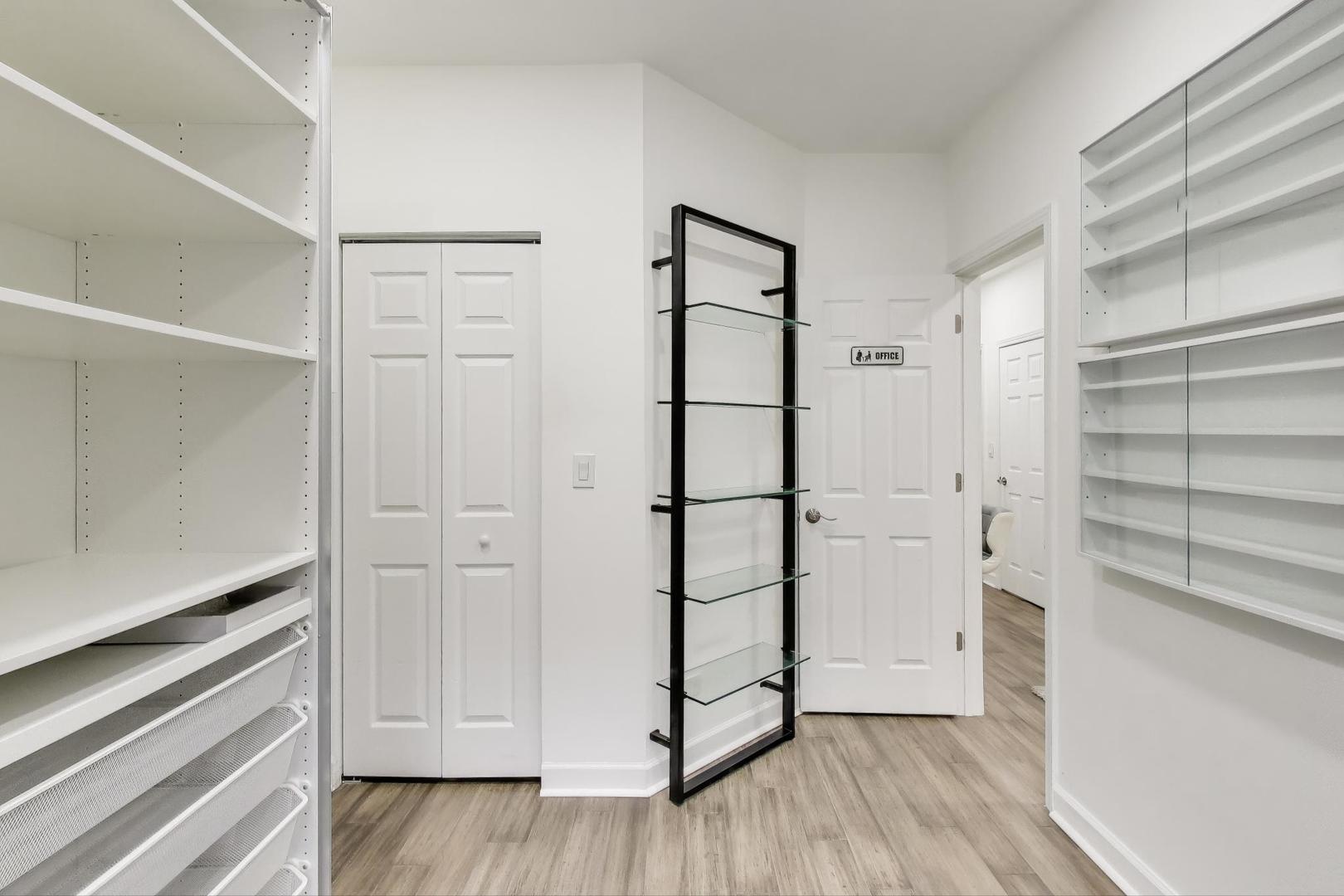 6421 North Greenview Avenue, Unit 2W Chicago, IL 60626 - Photo 13 of 23 a view of walk in closet with empty racks