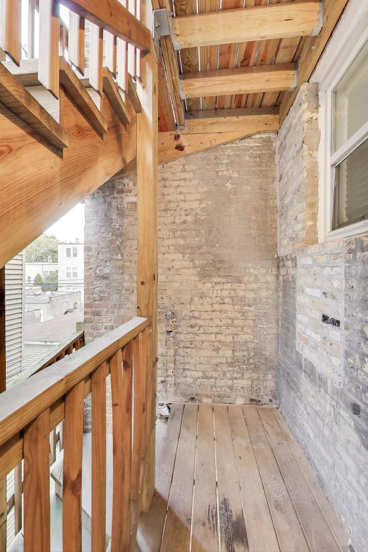 6421 North Greenview Avenue, Unit 2W Chicago, IL 60626 - Photo 17 of 23 a view of wooden balcony