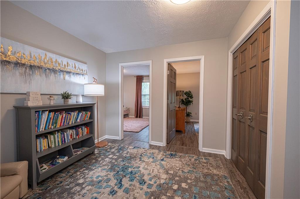 435 Cottage Lane Monroeville, PA 15146 - Photo 16 of 46 Expansive upper-level hallway with a large linen closet to keep everyday essentials organized