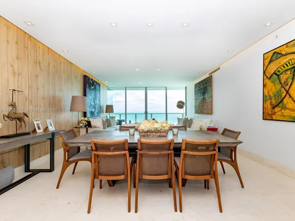 a view of a dining room with furniture