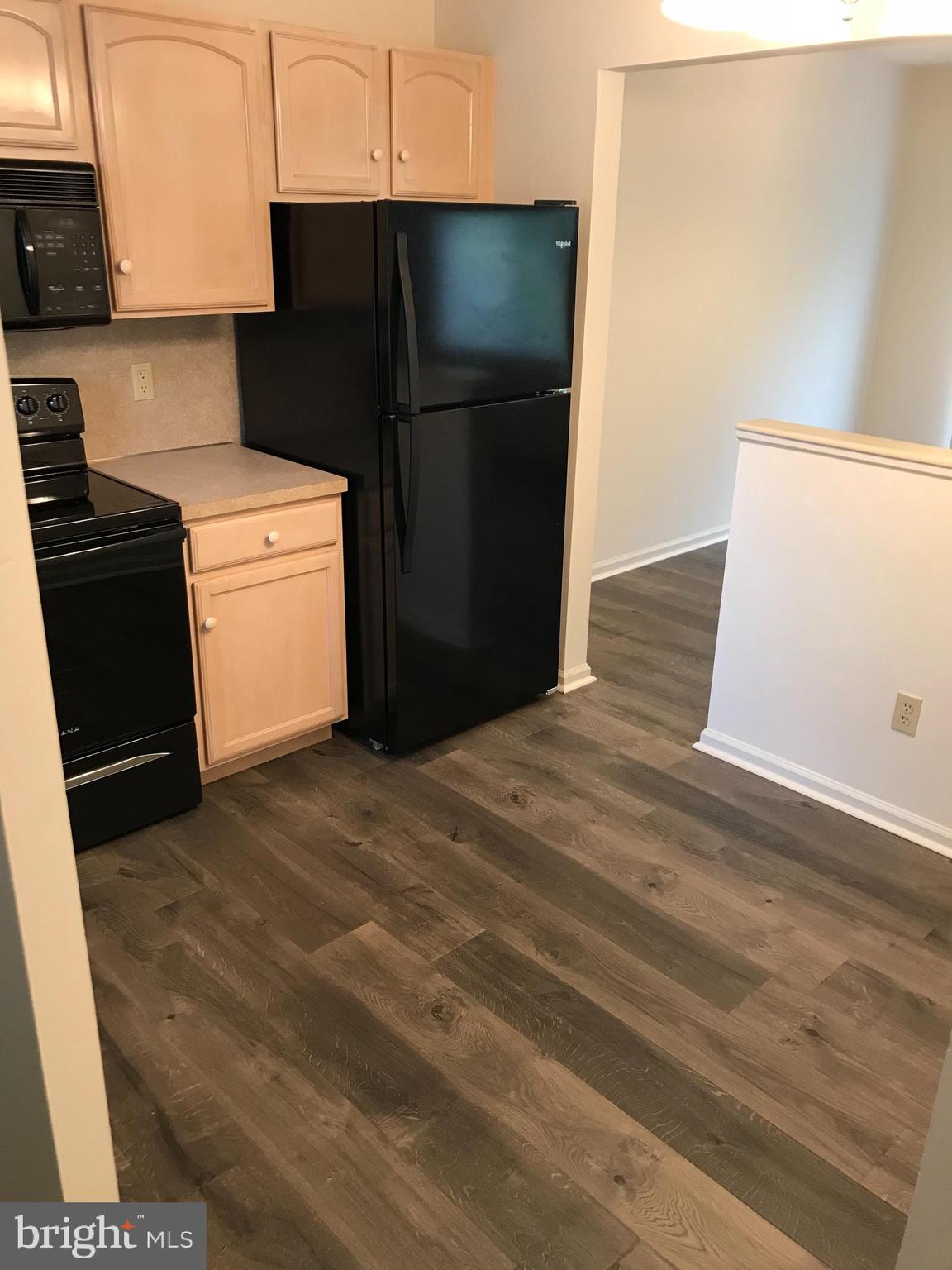 630 Front Street Lititz, PA 17543 - Photo 8 of 16 a kitchen with a refrigerator and a stove