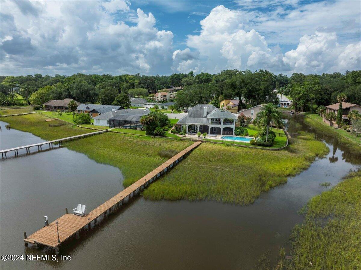 an aerial view of a house with a garden