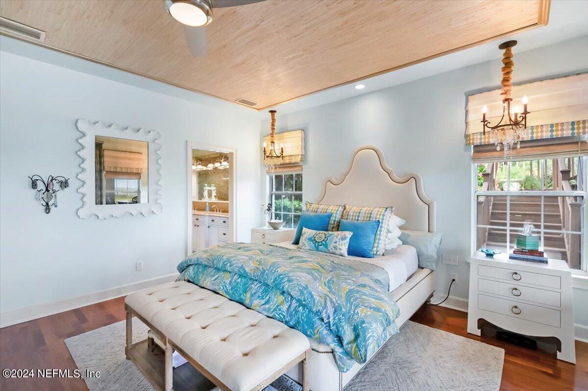 4295 Heath Road Jacksonville, FL 32277 - Photo 38 of 64 a bedroom with a bed and a window