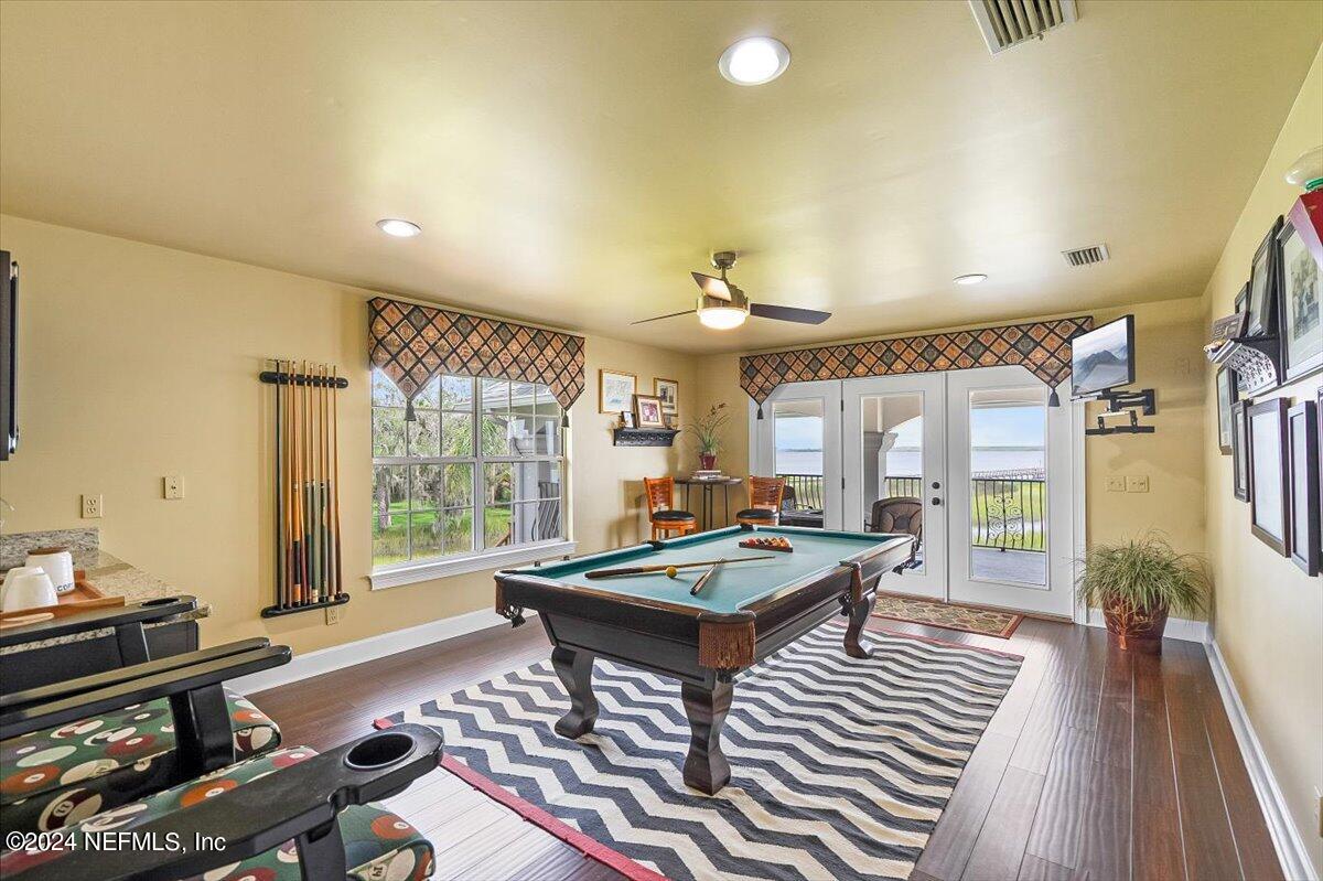 4295 Heath Road Jacksonville, FL 32277 - Photo 45 of 64 a living room with furniture and a large window