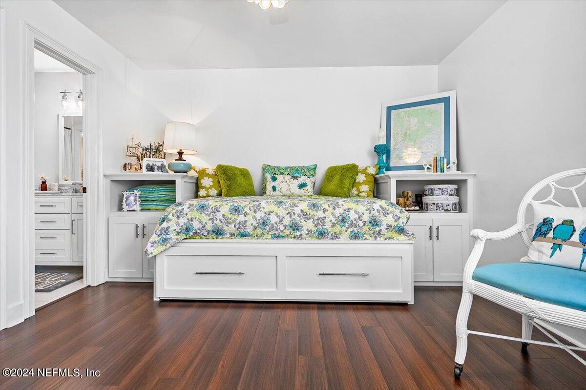 4295 Heath Road Jacksonville, FL 32277 - Photo 52 of 64 a living room with furniture and a wooden floor