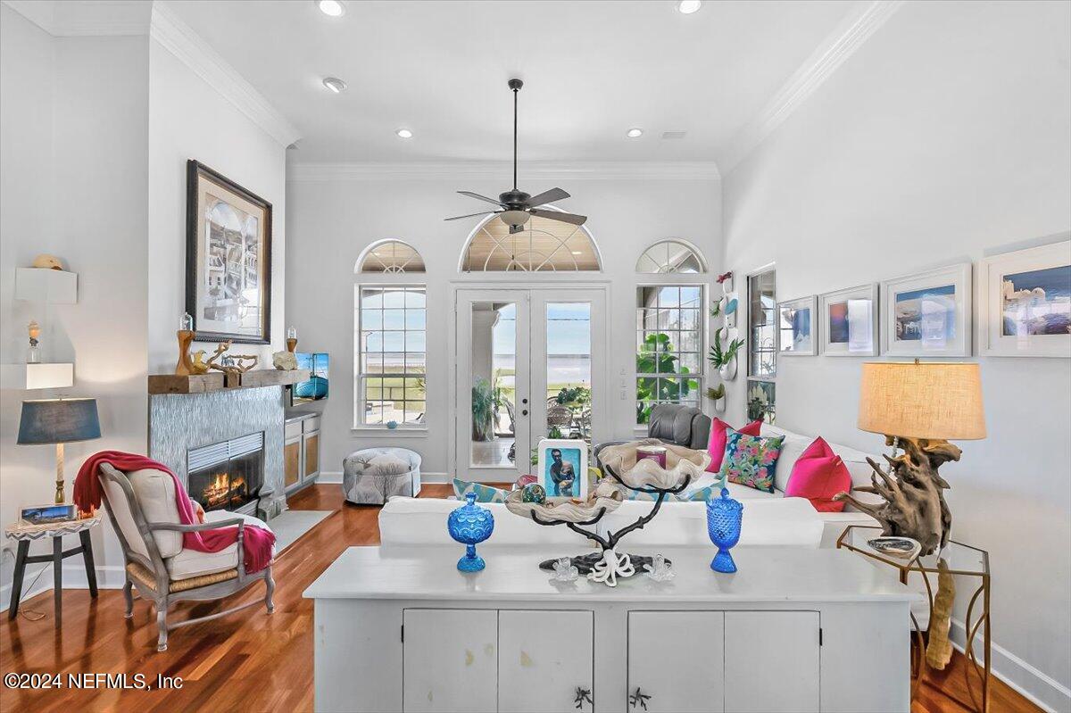 4295 Heath Road Jacksonville, FL 32277 - Photo 10 of 64 a view of a dining room with furniture and a chandelier