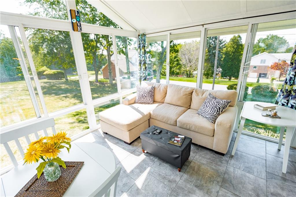 2011 Scheffel Road Pittsburgh, PA 15237 - Photo 11 of 29 a living room with patio furniture and a garden