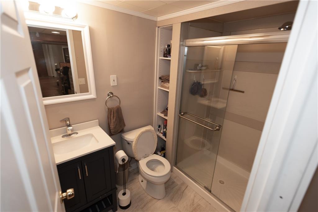 2011 Scheffel Road Pittsburgh, PA 15237 - Photo 21 of 29 a bathroom with a sink a toilet and shower