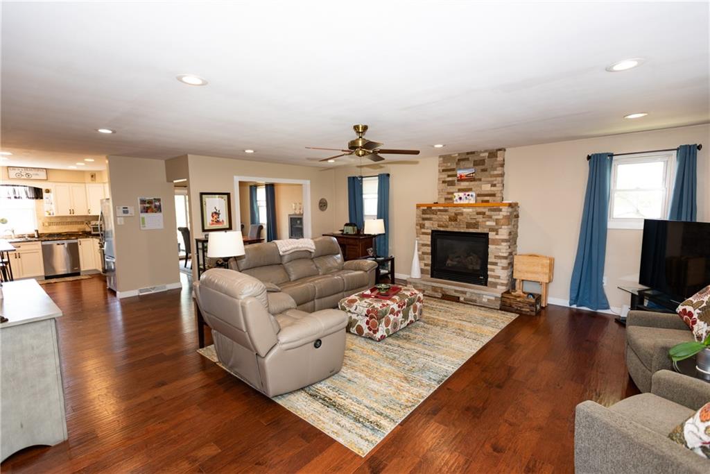 2011 Scheffel Road Pittsburgh, PA 15237 - Photo 4 of 29 a living room with furniture a fireplace and a flat screen tv