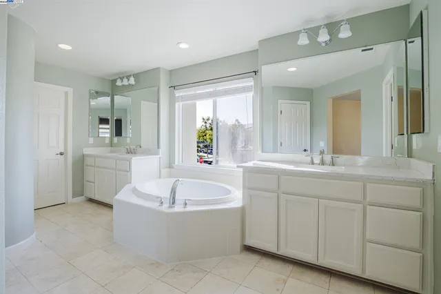 a bathroom with a sink a toilet and a bathtub