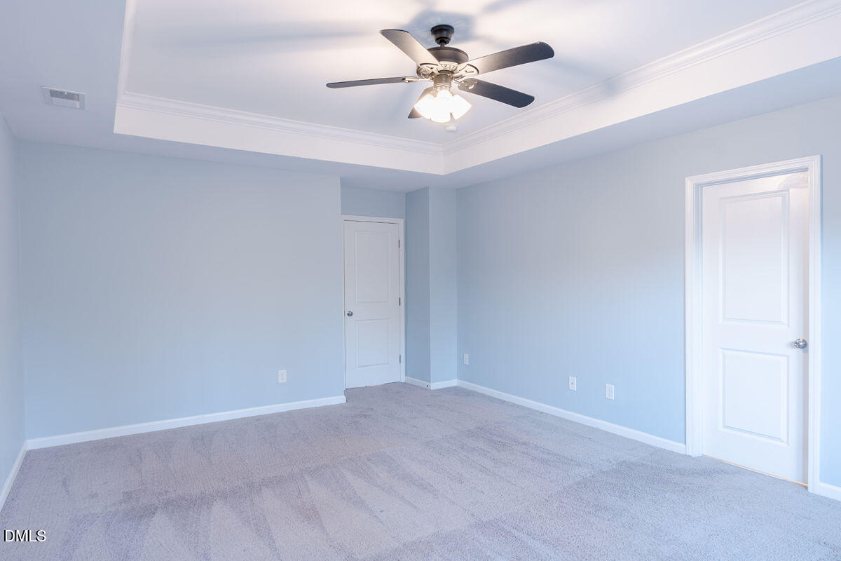 87 East Ravano Drive Clayton, NC 27527 - Photo 21 of 37 a view of an empty room