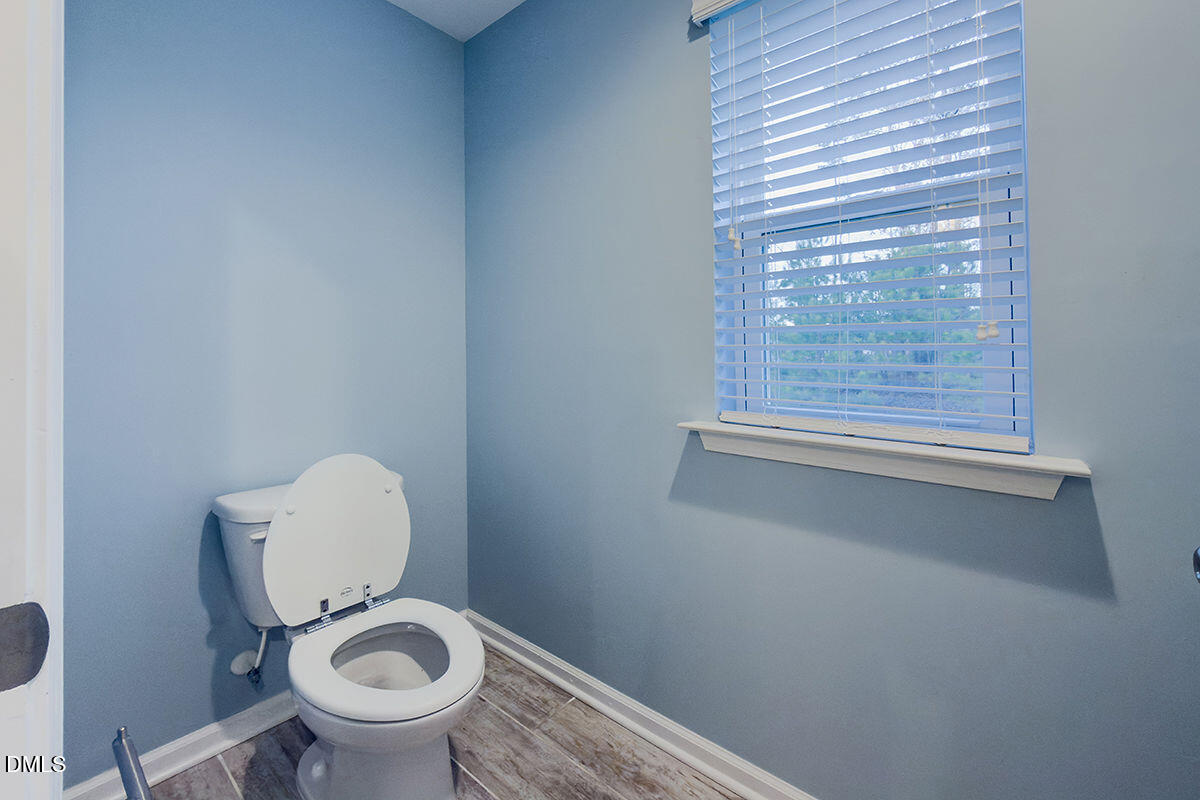 87 East Ravano Drive Clayton, NC 27527 - Photo 27 of 37 a bathroom with a toilet