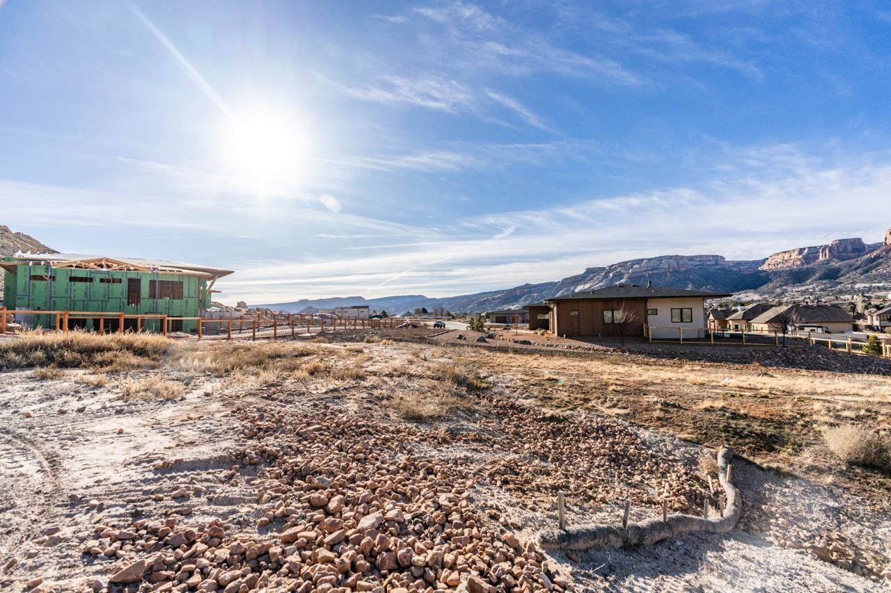 359 Canyon Rim Trail Grand Junction, CO 81507 - Photo 14 of 18 a view of a house with a yard