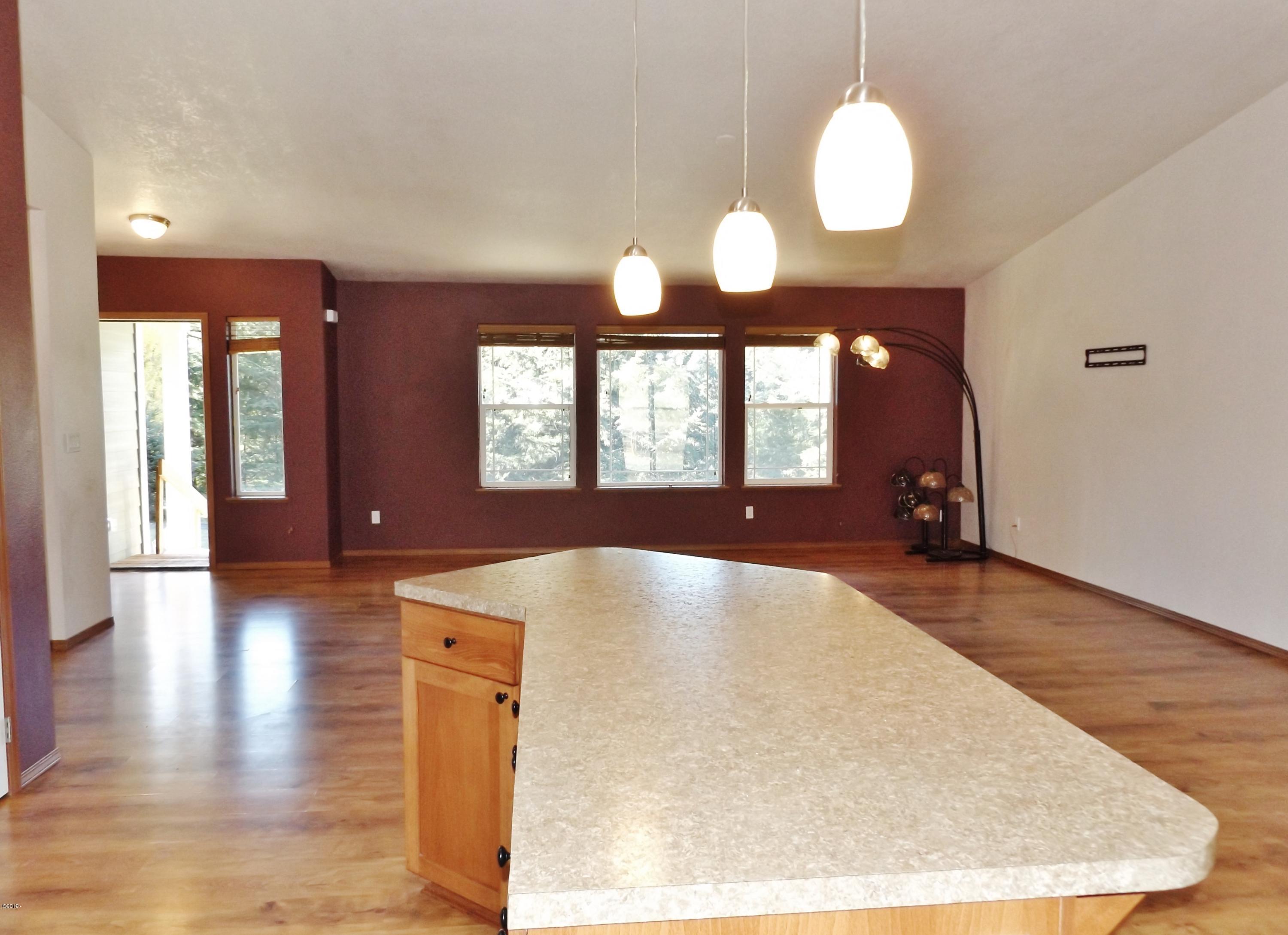 353 East Darkey Creek Road Waldport, OR 97394 - Photo 14 of 35 Kitchen Island and Great Room